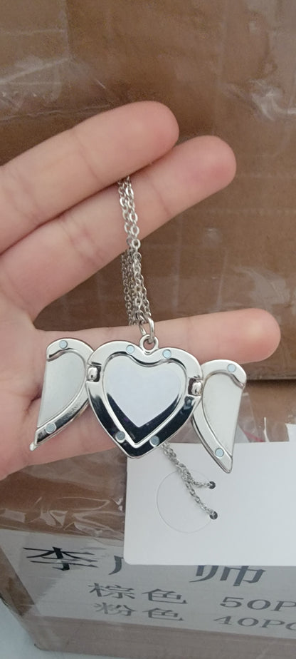 Angel heart locket necklace